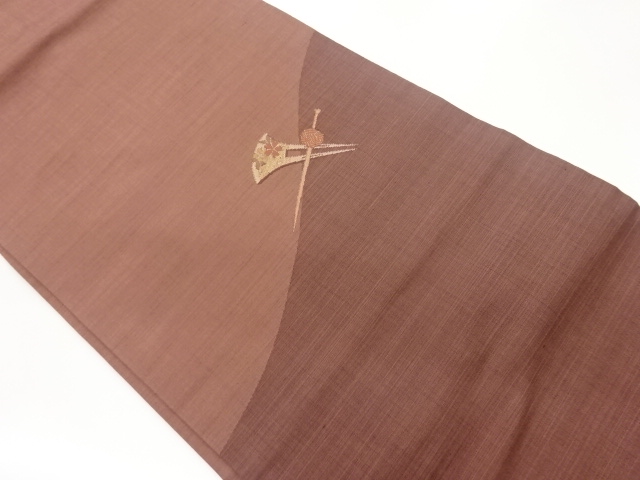 曲線に簪・桜模様織出し名古屋帯